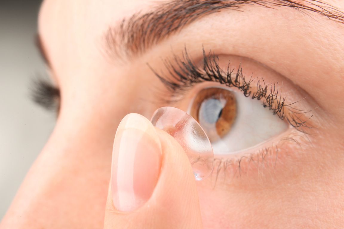 A Woman Putting On Contact Lens